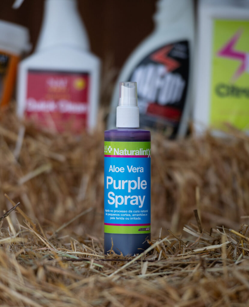 Product shot of a spray bottle with NAF Purple SPray